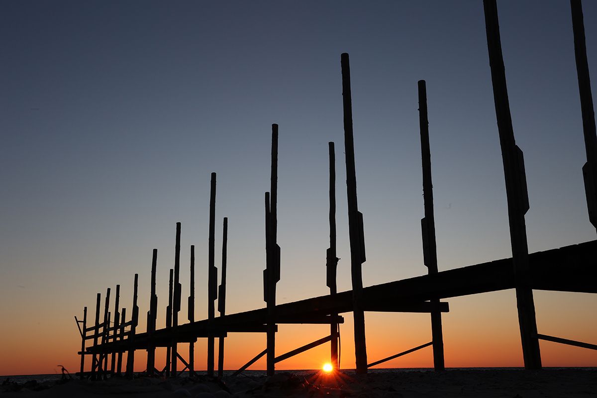 Steiger Waddenveer de Vriendschap op Texel met zonsopgang - door Foto Sanne